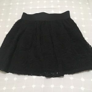 Black toile skirt with flower design. EUC